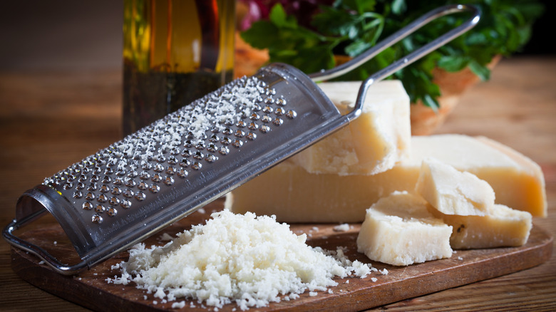 Parmesan cheese with grater