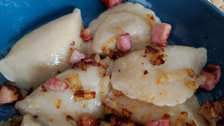 Pierogis coated in bacon grease