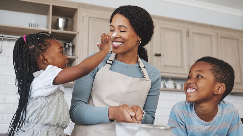 Mother and kids baking