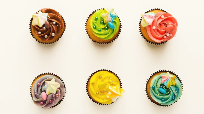 Assorted colored cupcakes