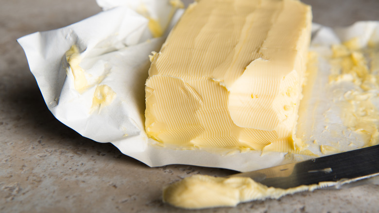 Block of butter with knife