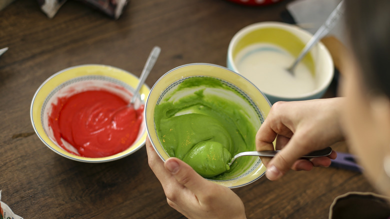 bowls of colored icing