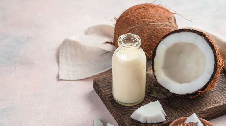 Halved coconut with milk