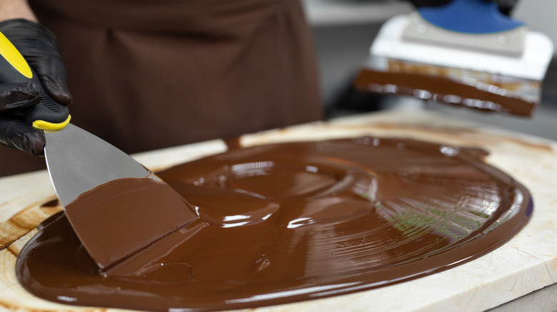 Tempering chocolate on granite slab