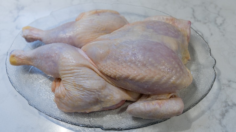 Chicken being brined