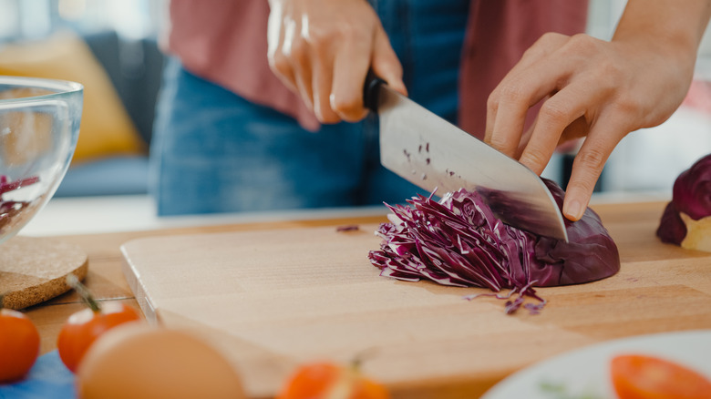Chopping red cabbage cutting board