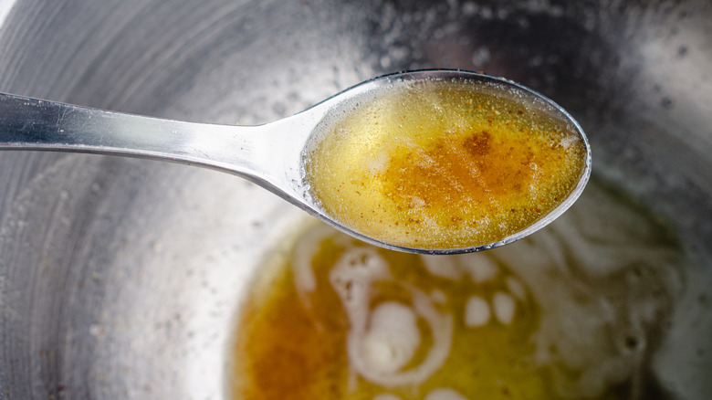 Browned butter with spoon