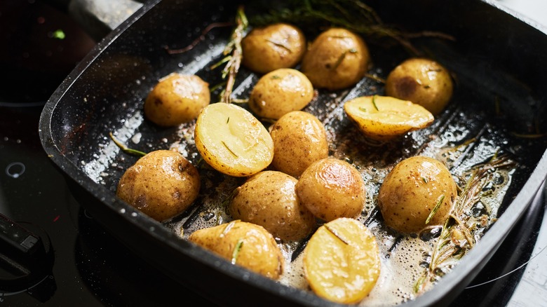 Potatoes roasting in butter