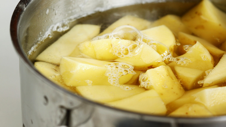 potato chunks in boiling water