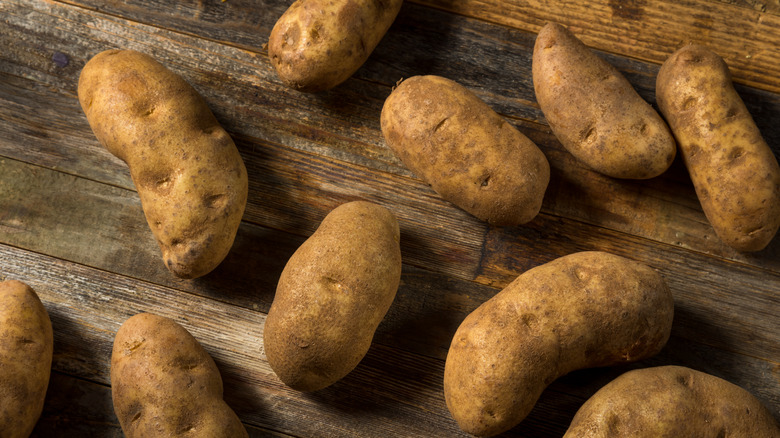 Russet potatoes on a table