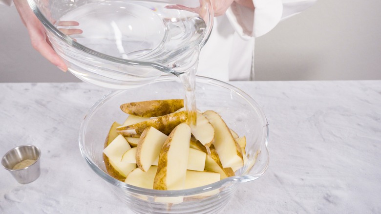 Potatoes soaked in water