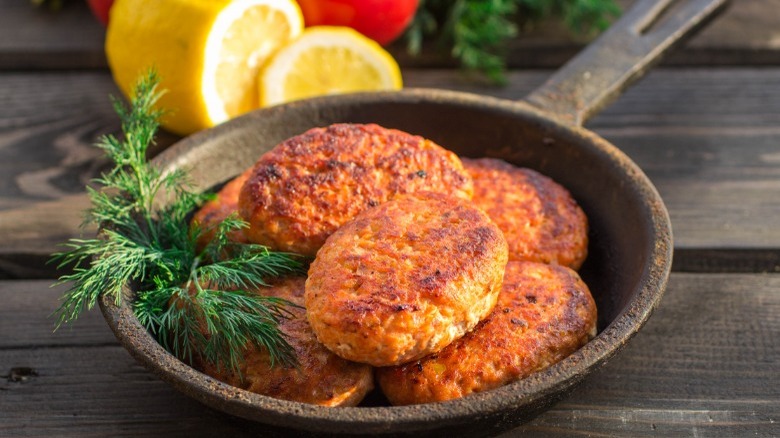 salmon cakes in a skillet