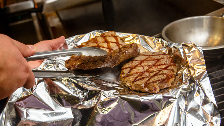 Grilled steak on a foil