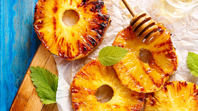 Grilled pineapple drizzled with honey