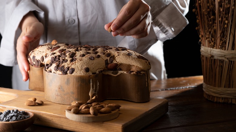 Adding chocolate to cake