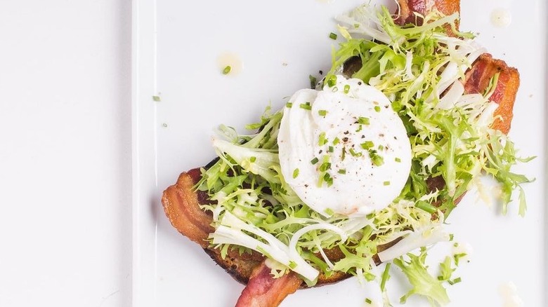 BLT topped toast on plate