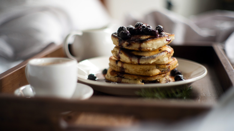 plate of fluffy berry pancakes