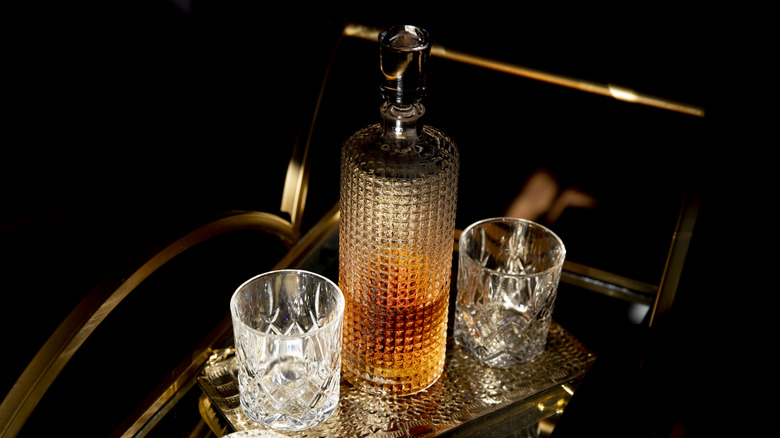 Whisky decanter and two crystal glasses