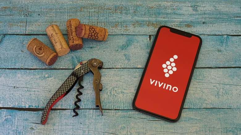 Vivino app with wine opener and corks
