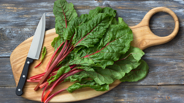 red chard on wooden board