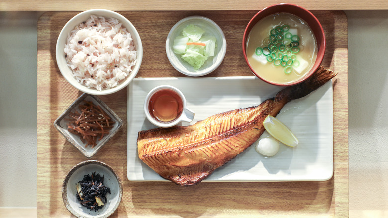 A teishoku or traditional Japanese set meal with fish and soup