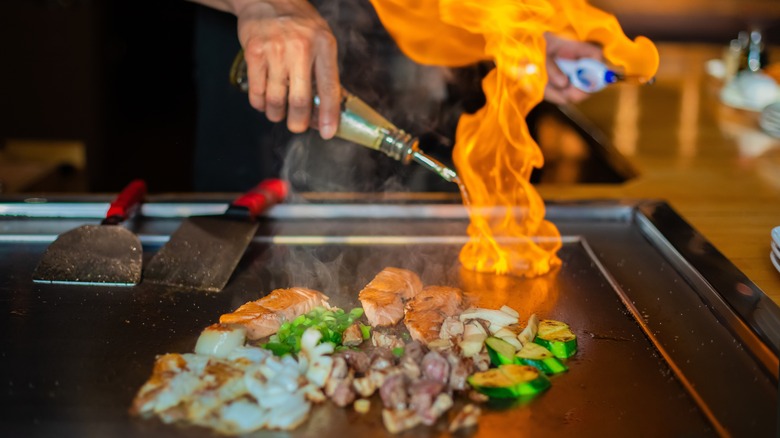 A teppan session with a flambé at a teppanyaki restaurant