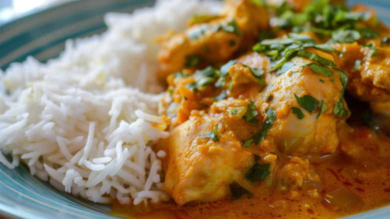 Bowl of curry with white basmati rice