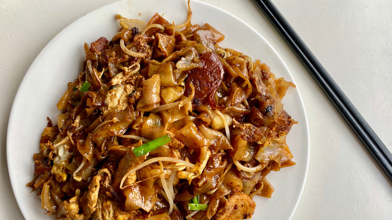 har kway teow with chopsticks 