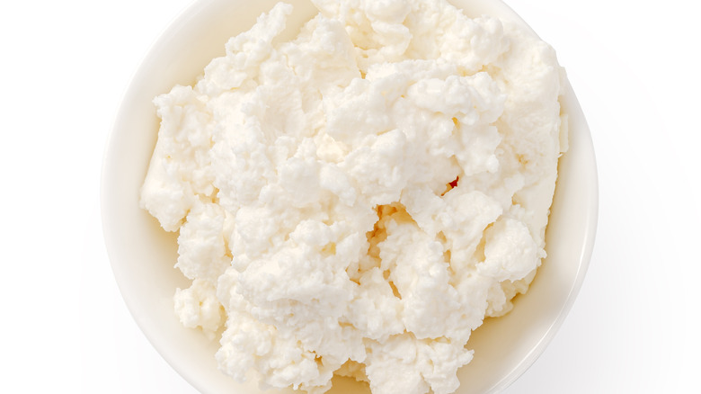 Ricotta cheese in white bowl