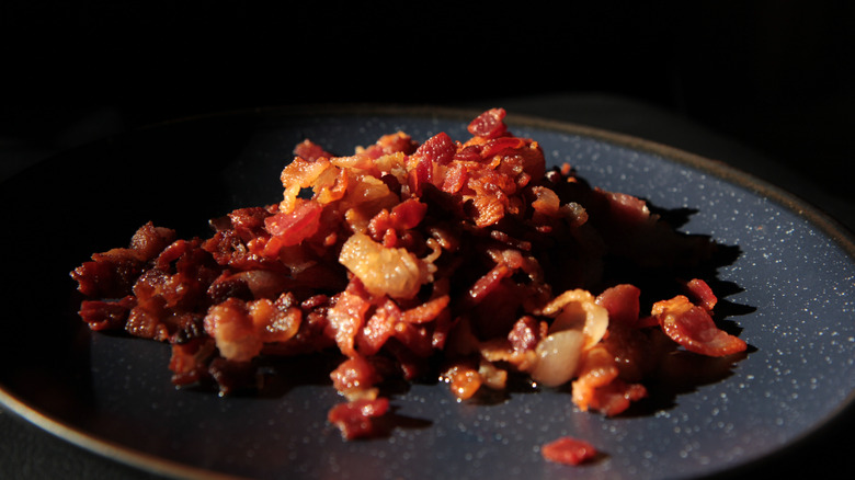 Crispy bacon crumbles on plate