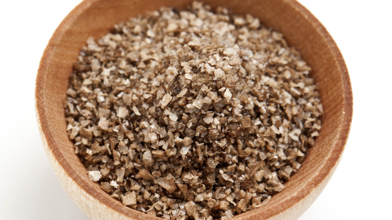 Smoked salt in wooden bowl