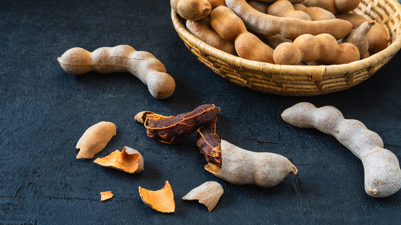 tamarind pods in basket