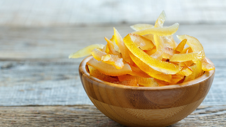Candied citrus in a wooden bowl