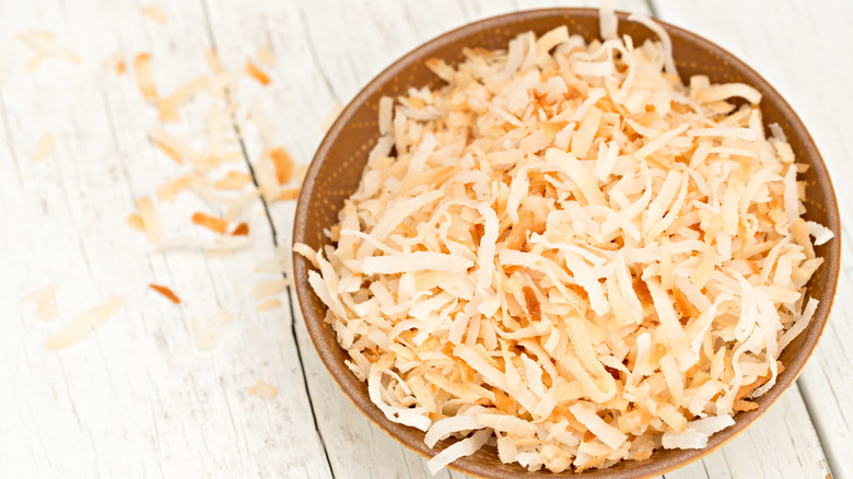 Bowl of toasted coconut flakes