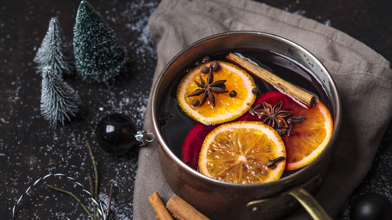 Pot of mulled wine with Christmas decorations