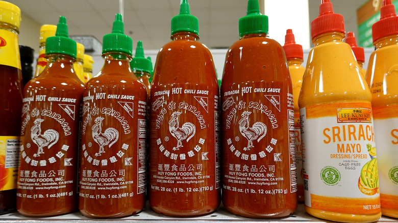 Bottles of sriracha sauce 