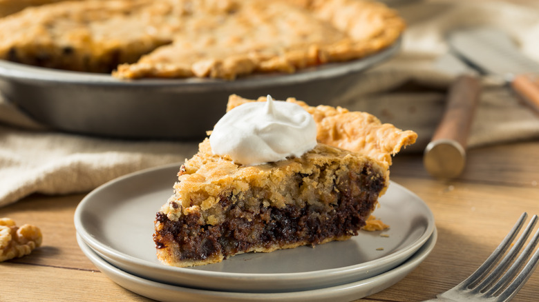 Kentucky Derby pie with whipped cream