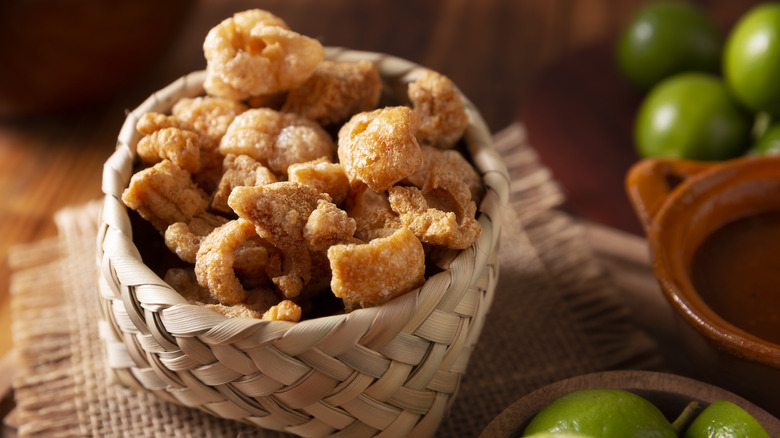 Fried chicharrónes in wicker basket