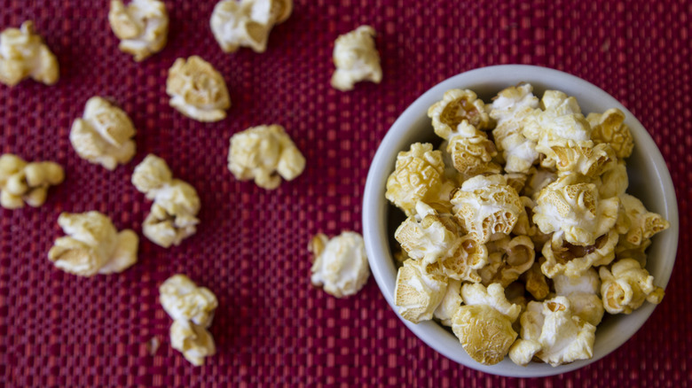 Kettle corn on red background