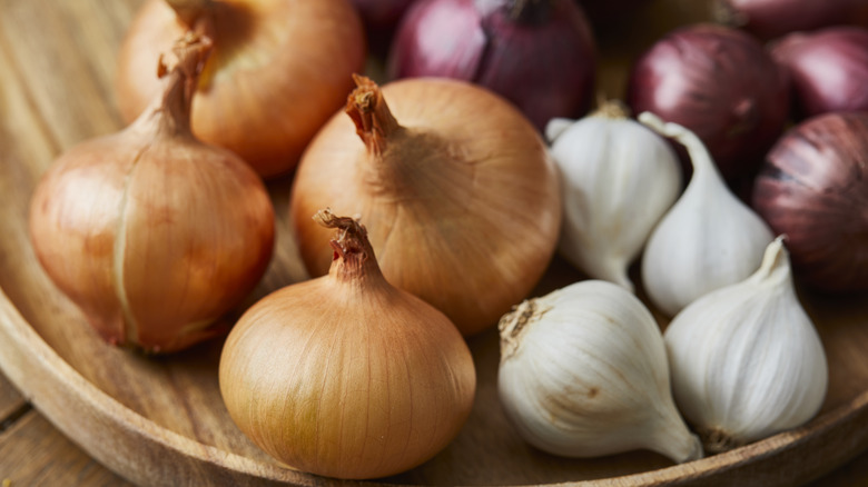 Garlic cloves and onions