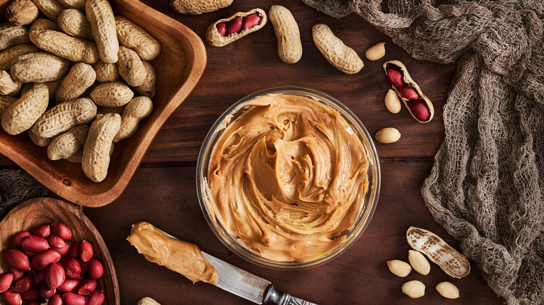 peanuts and peanut butter on vintage table