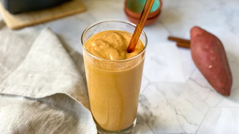 Sweet potato smoothie on table