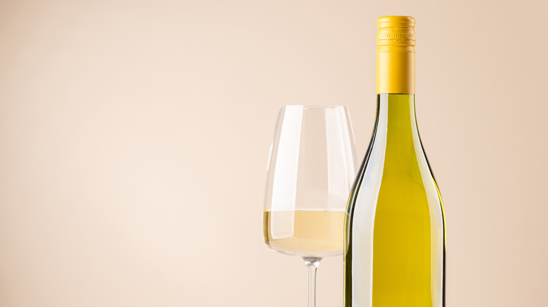 glass and bottle of white wine