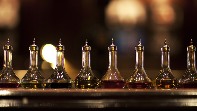 bitters lined up at a bar