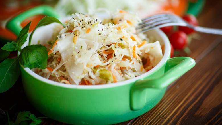 sauerkraut salad in green bowl