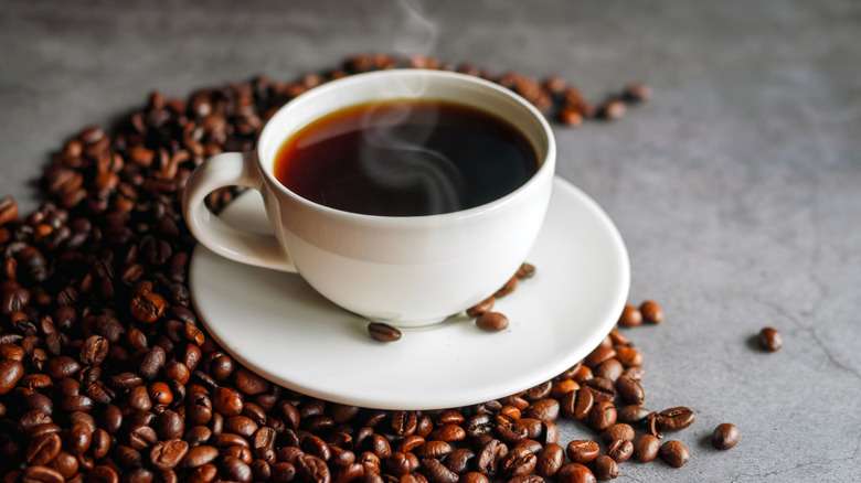 Coffee cup and coffee beans