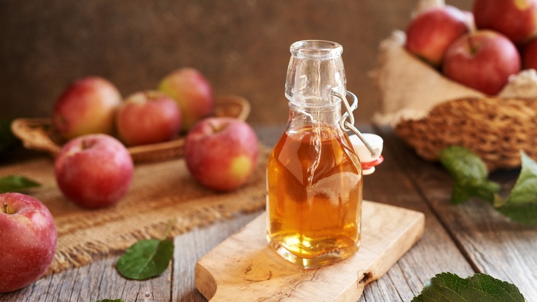 Apple cider vinegar in a glass bottle