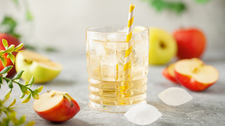 Apple juice and sparkling water in glass