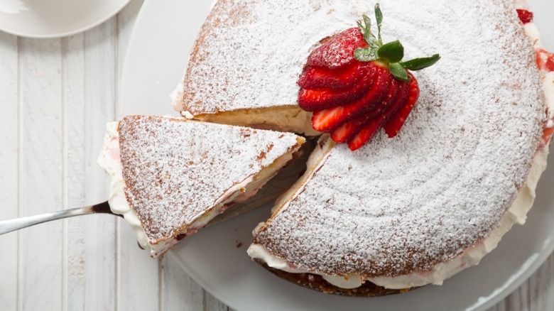 Powdered sugar dusted strawberry cake