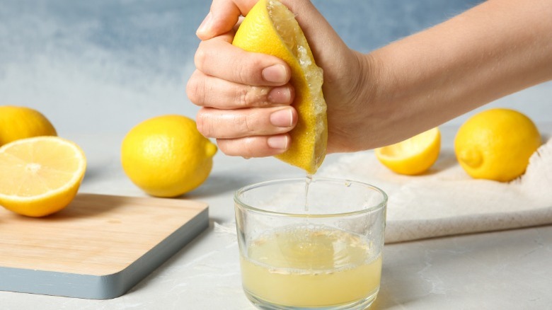 squeezing lemon juice